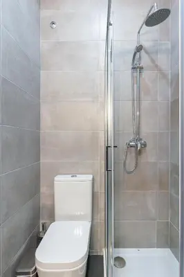 a bathroom with a toilet and a shower at Yellow Tiles by PCALE in Porto