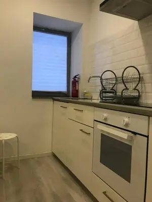 a kitchen with a stove and a window at City Heart Place 4 in Porto