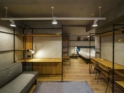 an overhead view of a living room with tables and chairs at ibis Porto Centro Mercado Bolhao in Porto
