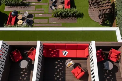 an overhead view of a house with red furniture at BessaHotel Baixa in Porto