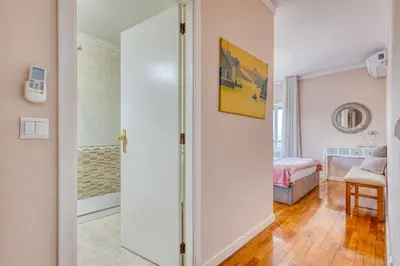 a room with a door leading to a bedroom at Candal Douro in Vila Nova de Gaia