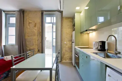 a kitchen with a sink and a counter top at Casas de Vera Cruz in Porto