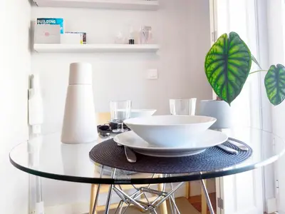 a glass table with a bowl on top of it at D858 - comfort near downtown - AC & balcony in Porto