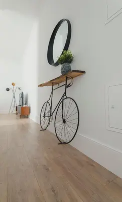a bike with a mirror on it in a room at Vibrant Host - Heroismo's Metro in Porto