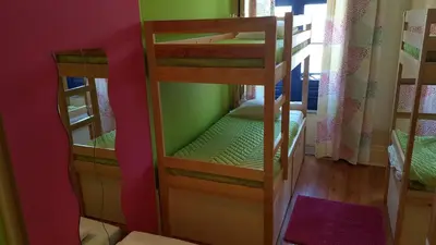 a room with two bunk beds in a room at CoolHostel in Porto