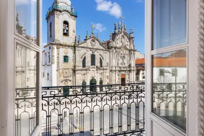an open window with a view of a church at Hungarian Biscuit Apartment in Porto