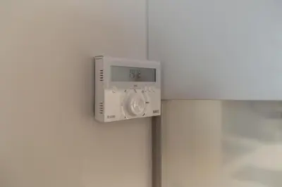a clock on the side of a wall at Premium Style Apt by Porto City Hosts in Porto