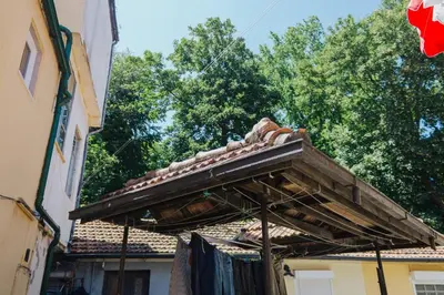 a roof of a building next to a building at House Romantic II in Porto