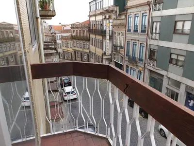 a view of a city street from a balcony at Alegria Downtown Apartments in Porto