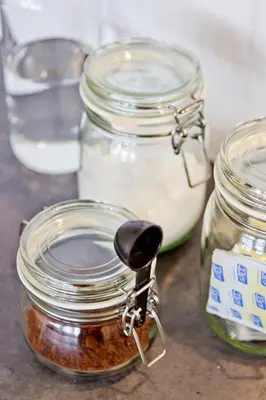 a jar with a spoon sticking out of it at Ribeira - Dixos Oporto Apartments III in Porto