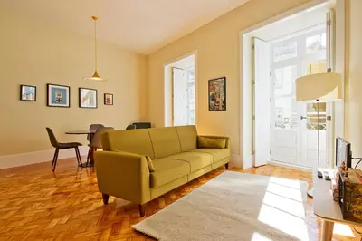 a living room with a couch and a table at Ribeira - Dixos Oporto Apartments IV in Porto