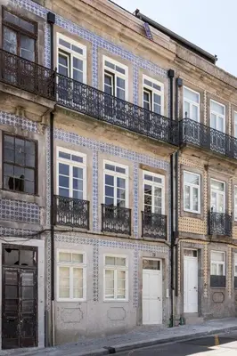 an old brick building with windows and balconies at Wine Luxury House in Porto