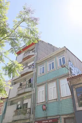 a tall building with balconies on the side of it at FLH Porto City Mezzanine Apartment in Porto