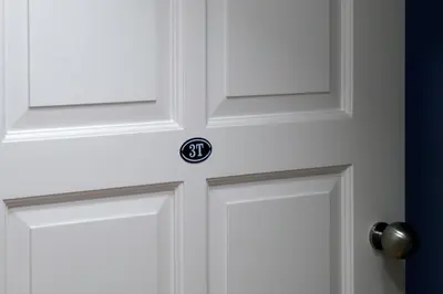 a close up of a white door with a knob at Trendy Flats Fontainhas in Porto