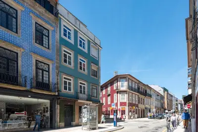 a group of buildings on a city street at Cedofeita Premium Apartment 1F in Porto