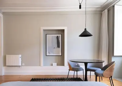 a dining room with a table and chairs at Cedofeita Premium Apartment 2F in Porto