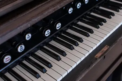 an old piano keyboard with black and white keys at Vilar Oporto Hotel in Porto