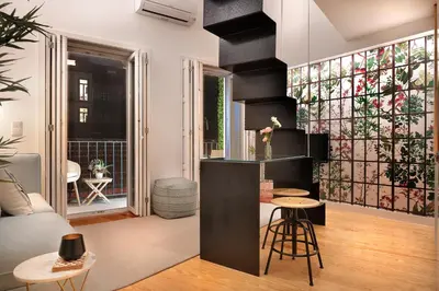 a living room with a couch and a table at Jasmine Loft in Porto