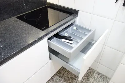 a kitchen with a black counter top and a drawer at Porto River Sunset 7th in Vila Nova de Gaia