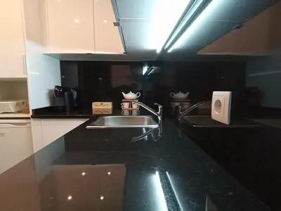 a kitchen with a sink and a counter top at Porto River Sunset 1st in Vila Nova de Gaia