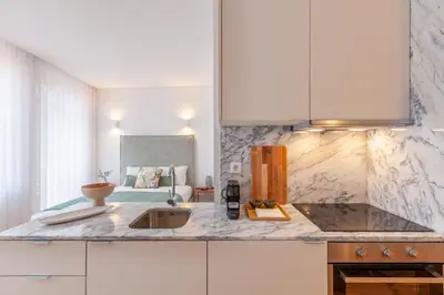 a kitchen with a sink and a counter top at D&S - Falling Leaves in Porto