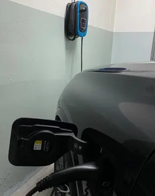 a bike with a side view mirror next to a car at Douro Riverfront 2BR with Private Terrace & Garage in Porto