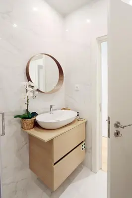 a bathroom with a sink and a mirror at HM - Segredo do Porto in Porto