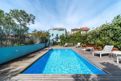 a swimming pool in the backyard of a house at HM - Segredo do Porto in Porto