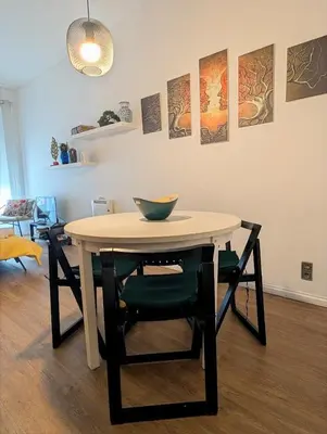 a table with a bowl on it in a room at Beautiful Infante Apartment in Porto