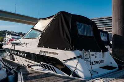 a group of boats are parked in the water at SLEEPBOAT YACHT in Porto