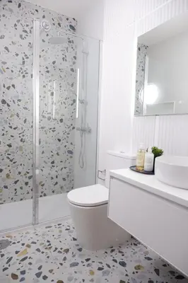 a bathroom with a shower and a toilet and a sink at Porto Family Home by MP - Renovated in Porto