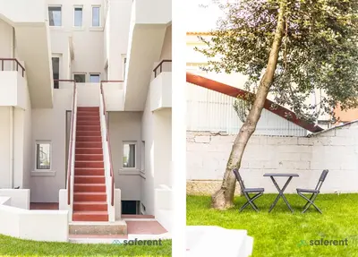a building with stairs and a table and a tree at Bombarda Homes in Porto