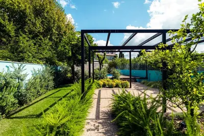 a garden with a pergola and plants at Swimming Pool Luxury House 2 in Porto