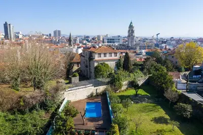 an aerial view of a building with a garden at Swimming Pool Luxury House 2 in Porto