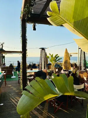 a restaurant with a view of the ocean at Porto Wine Loft Duplex with swimming pool in Vila Nova de Gaia