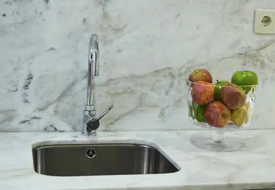 a bowl of fruit sitting next to a sink at ChillHouse_Porto - Praça da República in Porto