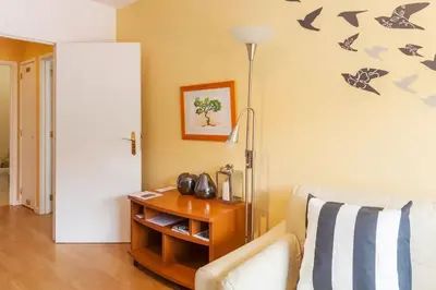a living room with a couch and a table at O´Porto Fontinha Flat in Porto