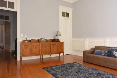 a living room with a couch and a table at Bonjardim 466 - Historic Townhouse in Porto