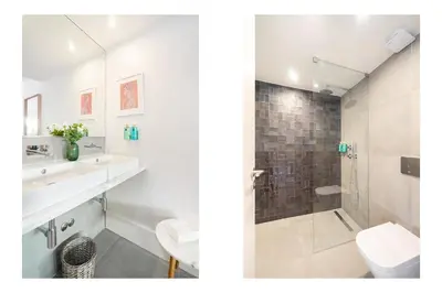a bathroom with a shower and a sink and a toilet at Villa Almada - Amazing City Centre Villa with Private Pool in Porto