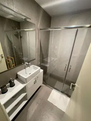 a bathroom with a shower and a sink at CC Downtown Palace - F in Porto