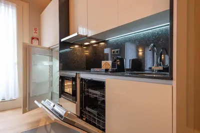 a kitchen with an oven and a counter top at CC Downtown Palace - J in Porto