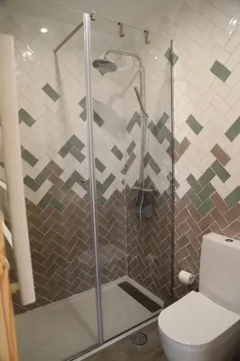 a bathroom with a shower and a toilet at Casa do Pilar - D Maria Pia in Vila Nova de Gaia