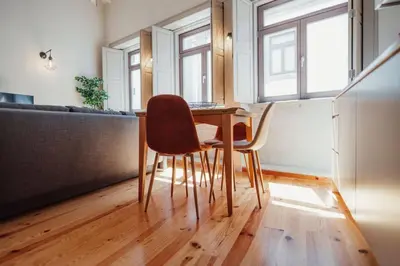 a dining room with a table and two chairs at Oporto Artist´s Loft in Porto
