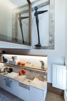 a kitchen with a sink and a mirror at The Bitcoin Chapel Iconic Luxury Residence in Porto