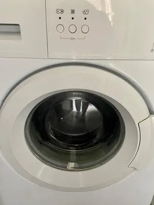 a close up of a washing machine at PORTO RICO STUDIOS in Porto