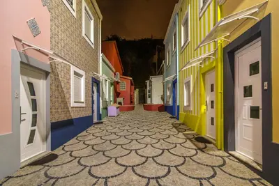 an alley with colorful buildings in a city at Maredimo Village Porto Casa 5 in Porto