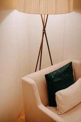 a bedroom with a bed with white pillows at Casa da Companhia Hotel & Spa, Vignette Collection by IHG in Porto