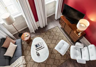 a living room with a couch and a table at Almada 234 in Porto