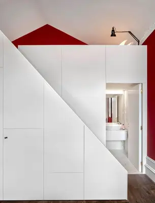 a living room with a couch and a kitchen at Almada 234 in Porto