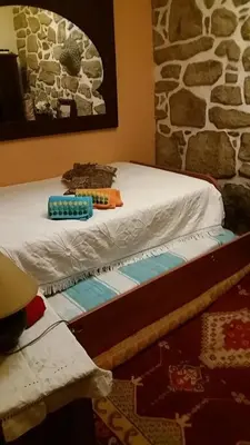 an open door in a yellow room with a window at Al Pinheiro 66 in Porto
